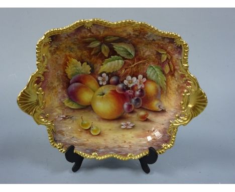 A ROYAL WORCESTER TWIN HANDLED SQUARE DISH, hand painted with apples, pear, peach, cherries and grapes to mossy bank, gilt sh