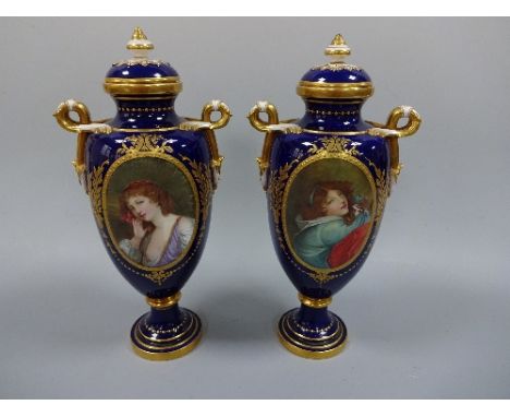 A PAIR OF 19TH CENTURY MINTONS TWIN HANDLED VASES AND COVERS, the ovoid bodies having portrait cartouches, pensive maiden and