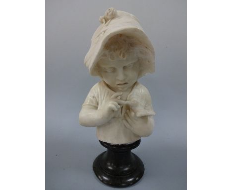 A 19TH CENTURY WHITE MARBLE PORTRAIT, Child feeding bird, wearing floral mounted bonnet, set on turned black marble socle, (b
