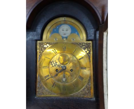 AN OAK AND MAHOGANY EIGHT DAY LONG CASE CLOCK, swan neck pediment supported on columns either side door to arched brass 12' d