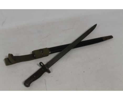 A 1907 PATTERN SANDERSON BAYONET in scabbard with green canvas frog