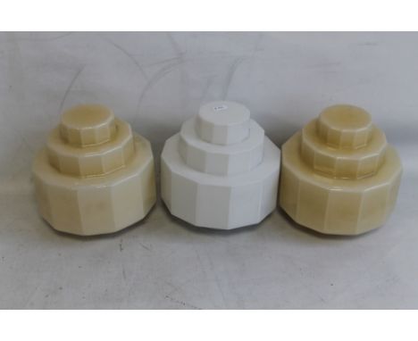 A PAIR OF ART DECO STEPPED CUBIST GLASS LAMP SHADES, together with a white milk glass example,&nbsp;H 23 cm, Dia 23 cm, Inner