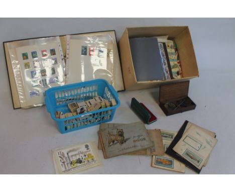 A SMALL COLLECTION OF VARIOUS BRITISH AND WORLDWIDE STAMPS, loose and in albums, to include first day covers, a quantity of c
