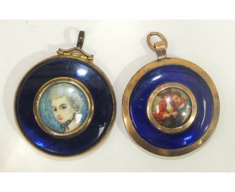 A blue glass and gilt metal circular locket inset a miniature portrait and another, similar, (2).