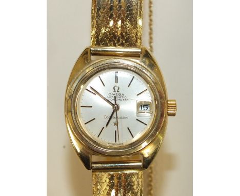 Omega, a ladies Automatic Chronometer Constellation wrist watch, the silvered dial with baton numerals and date aperture, wit
