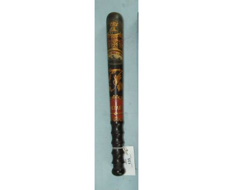 A Victorian lignum vitae truncheon with gilt and painted Royal cypher and marked Constable in red cartouche above a moulded g