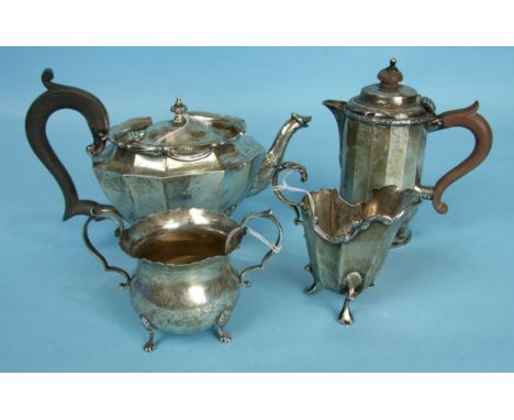 A twelve-sided oval bachelor's teapot and cream jug, Birmingham 1927, a small hot water jug and a sugar bowl, total weight __