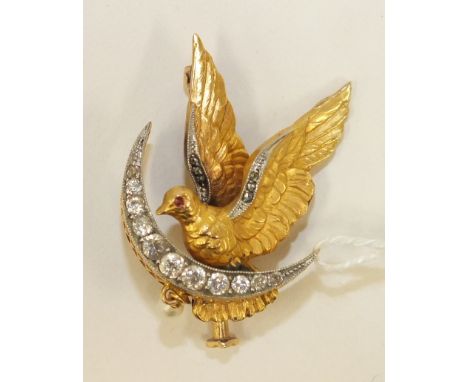 An 18ct yellow and white gold brooch in the form of a dove alighting on a crescent moon, the dove with ruby eye and diamond a