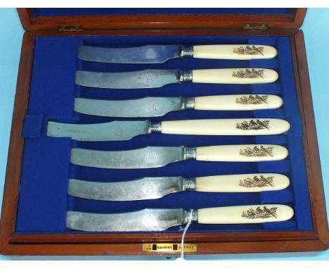 A Victorian game eating set: six each steel knives and plated forks together with carrying knife and fork, the handles decora