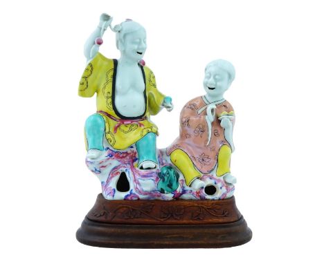 Size:(Height 25.6CM An antique Chinese, Qing Dynasty, Famille Rose polychrome hand enameled figural group. The figural group 