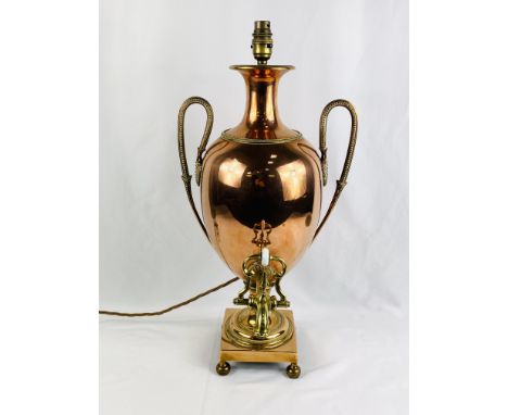 Georgian copper and brass samovar of urn shape, later converted to a table lamp, 56cm high. Estimate: £30-60.