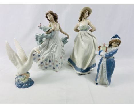 Lladro figurine of a dancing lady, 31cms; together with a Nao figurine of a lady and a Nao figurine of a swan; Nao figure of 