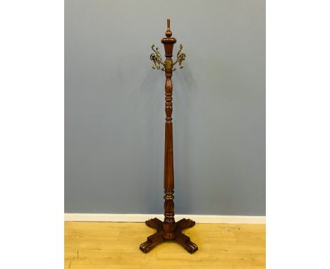 Reproduction antique style solid mahogany revolving hat and coat stand with bronzed effect hangars, 45 x 45 x 175cms. Estimat