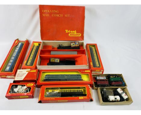 00 gauge Triang railways operating mail coach part set in box, three Triang coaches in boxes, Triang engine, together with a 