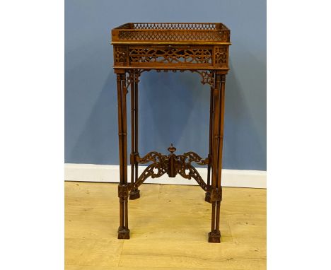 Reproduction Chippendale style fretwork carved mahogany urn stand with two pull out cup slides, 33 x 33 x 66cms. Estimate £20