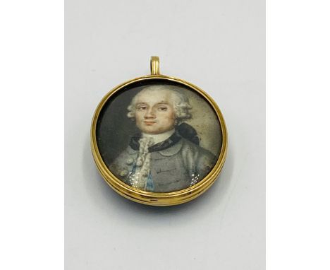 19th century portrait pendant on yellow metal mount.. Estimate £100-200