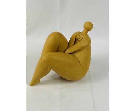 K Arastala, Stoneware seated nude female figure, signed by artist, 18cms. Estimate £20-40.