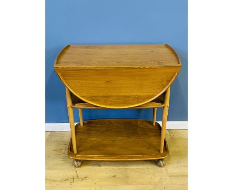 Ercol style three tier drop leaf serving trolley to castors with galleried edges, 73 x 46 x 77cms (closed) ans 73 x 96 x 77cm