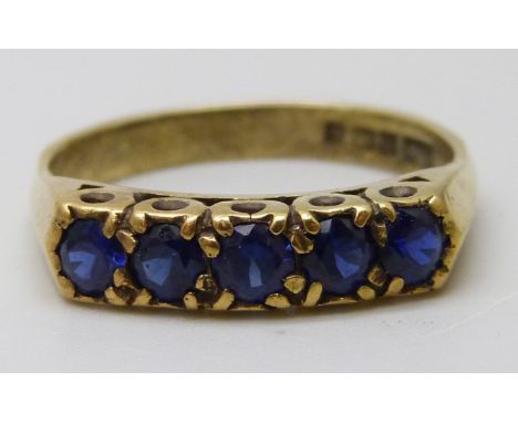 A silver gilt, five stone sapphire ring, P