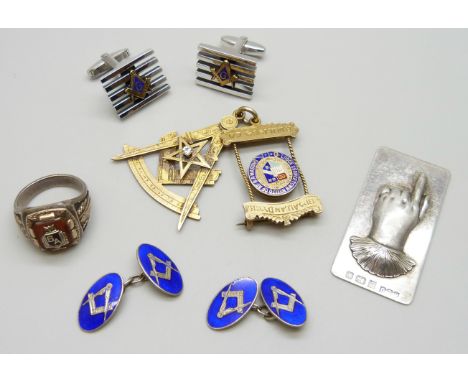 A novelty silver bookmark, a silver gilt Masonic medal, a pair of silver Masonic cufflinks, a silver and gold plated graduati