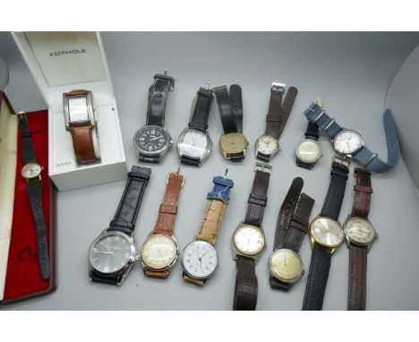 A collection of wristwatches including vintage 