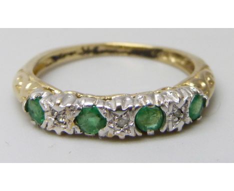 A yellow metal, emerald and diamond ring, stamped 9k, 1.8g, N