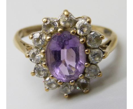 A 9ct gold, amethyst and cubic zirconia cluster ring, 2.4g, M