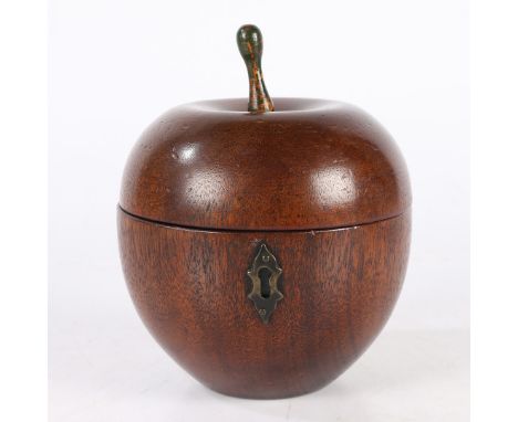 An Early 20th century oak tea caddy in the form of an apple, 15cm high.  *CR  general marks and scuffs.