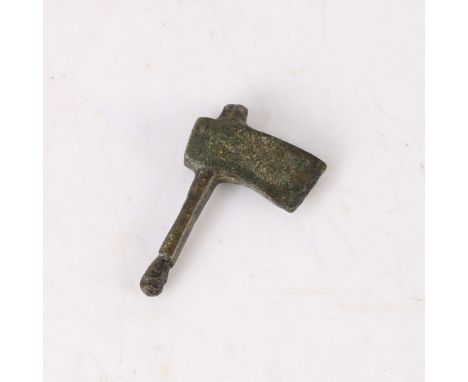 The axe head cast as one piece to the handle, 3.5cm high.  Found Suffolk.  *CR  Overall good found condition.