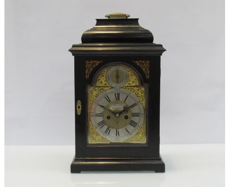 William Whitbread, London: an 18th Century ebonised bracket clock with arched brass dial and ormulu spandrels, silvered Roman