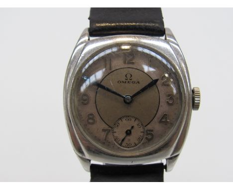 OMEGA: an early to mid 20th Century steel cushion cased gent's manual wind wristwatch, two tone silvered Arabic dial with sub
