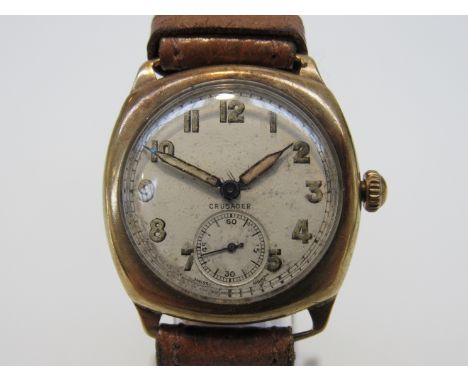 A 9ct gold cushion cased gent's manual wind wristwatch, Arabic silvered dial signed "Crusader" with subsidiary seconds, case 