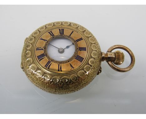 An early 20th Century Continental 18K half hunter fob watch with Roman enamelled dial, highly engraved and engine turned case