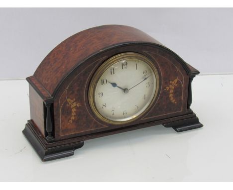 An Edwardian burr maple, ebonised and satin/mother of pearl inlaid desk timepiece, Arabic silvered dial with engine turned ce