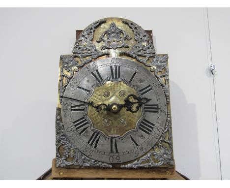 A late 18th/early 19th Century Belgian tall longcase clock in oak case, brass arched dial with silvered Roman chapter ring an