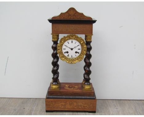 A 19th Century French ebonised and inlaid portico mantel clock, Roman enamelled dial (a/f), faded inlaid case with twisted su