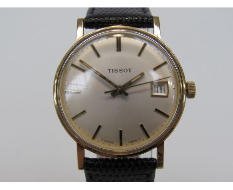 TISSOT: An 18ct gold cased gent's manual wind wristwatch with silvered dial, centre seconds and date, presentation inscriptio