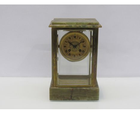 A mid to late 19th Century French onyx cased four glass mantel clock with gilded Roman chapter ring, 8 day movement with rack
