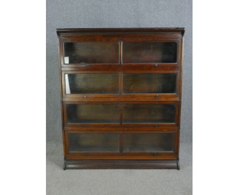 A 19th century mahogany Globe Wernicke style four section bookcase. H.154 W.128 D.36cm. 