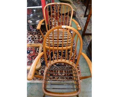 Two Ercol style spindle back armchairs (2) 