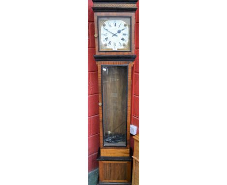 An oak and rosewood longcase clock inscribed Kienzle International to face.