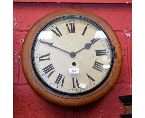 A 19th century oak cased station clock