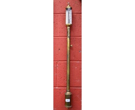 A brass cased ship's stick barometer, the weather indicator inscribed K.D.J.T.C. 16a22 Dejoka London