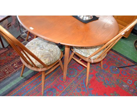 An Ercol blonde dropleaf table and four spindle back chairs (5) 