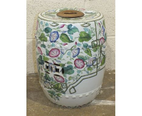 A Copeland late Spode ceramic garden seat decorated with petunia flowers entwined in a branch trellis, 46cm high, 30cm diamet