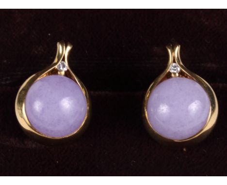 A pair of gold, diamond and lavender jade ear clips