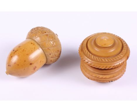 A vegetable ivory thimble holder, formed as an acorn, and a similar trinket box and cover