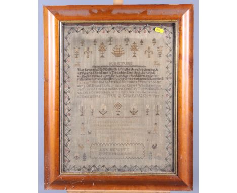 An early 19th century needlepoint sampler, by N Hewitt Nottingham, with scripture verse, 18" x 13", in maple frame