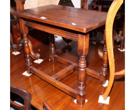 A 17th century design oak coffee table, 24" wide, a small oak drop leaf coffee table, a child's double school desk and a turn