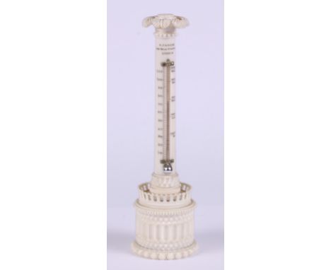 A desk thermometer, on carved ivory column